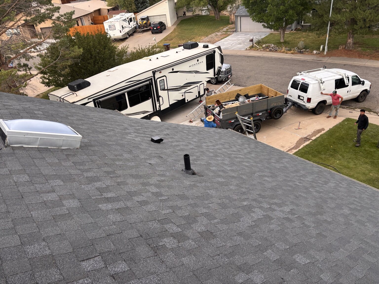 Completed architectural shingle roof field