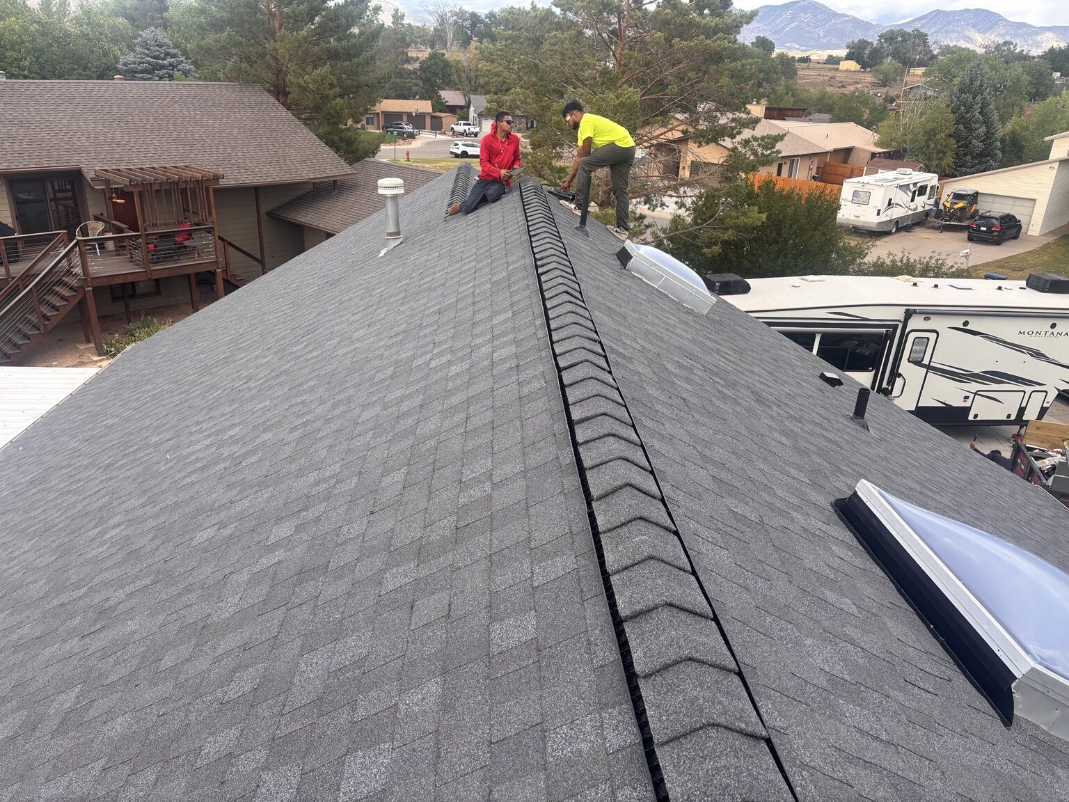 Completed architectural shingle roof with ridge cap